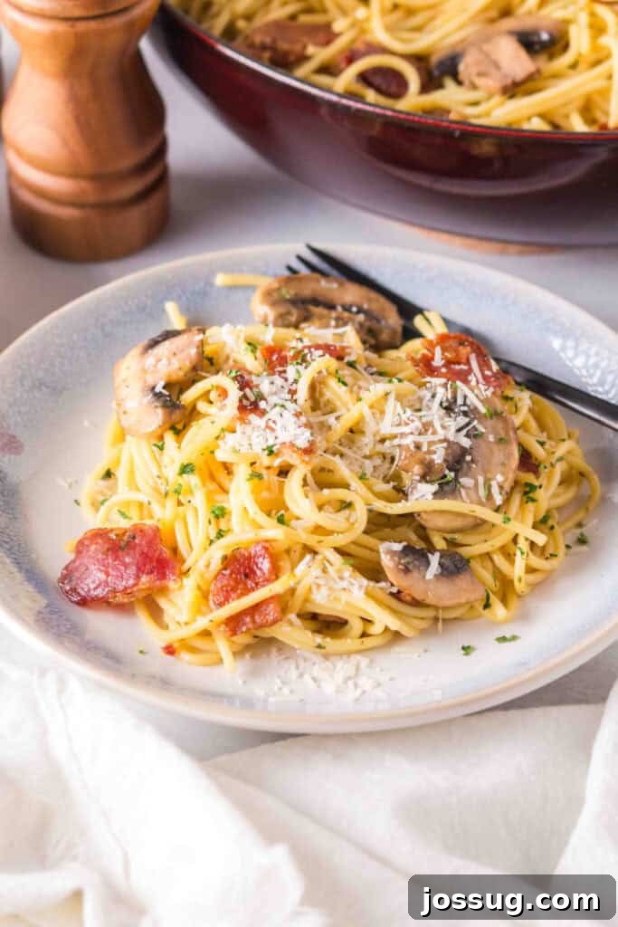 Bacon & Mushroom Carbonara 2 Delicious Bacon Mushroom Carbonara on a plate