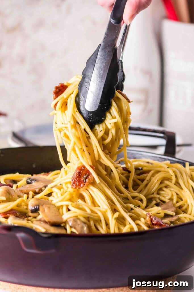 Bacon & Mushroom Carbonara 11 Close up of spaghetti with mushrooms and bacon