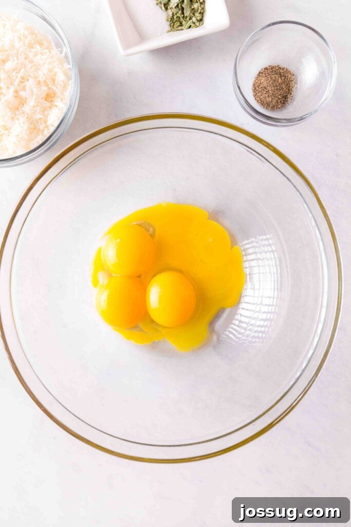 Bacon & Mushroom Carbonara 3 Egg yolks in a bowl with cheese and spices