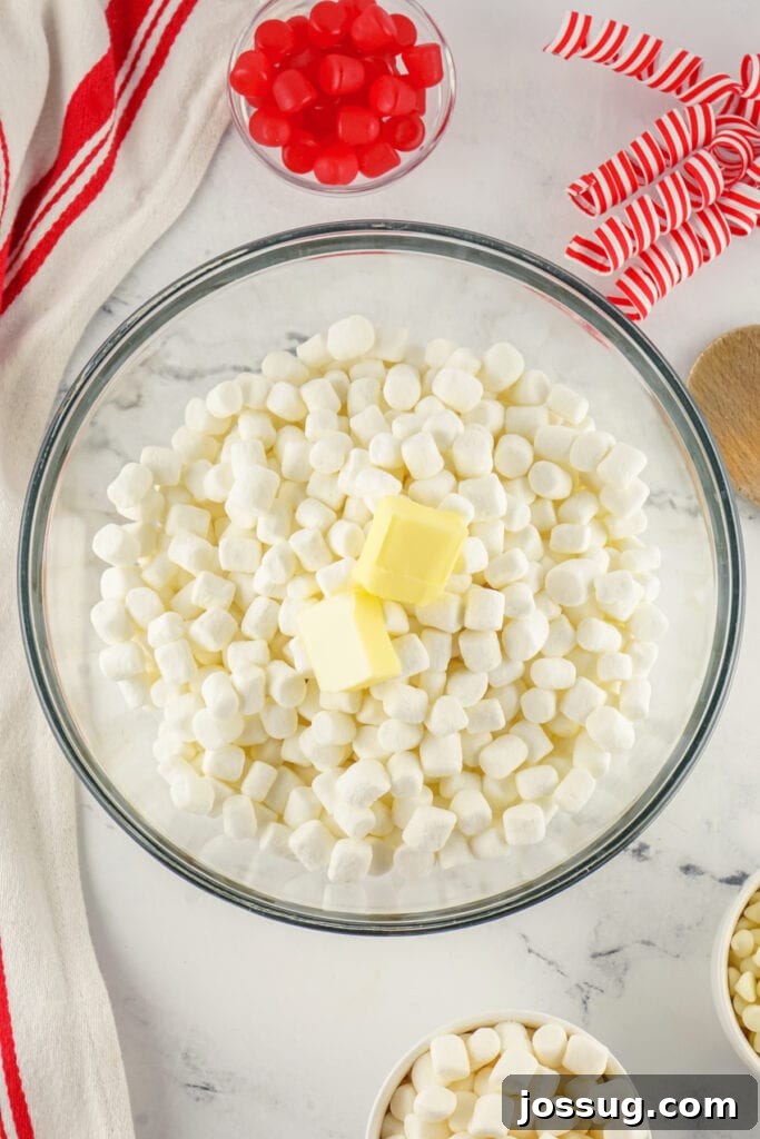 Grinchmas Nougat Nibblers 4 Mini marshmallows and butter.
