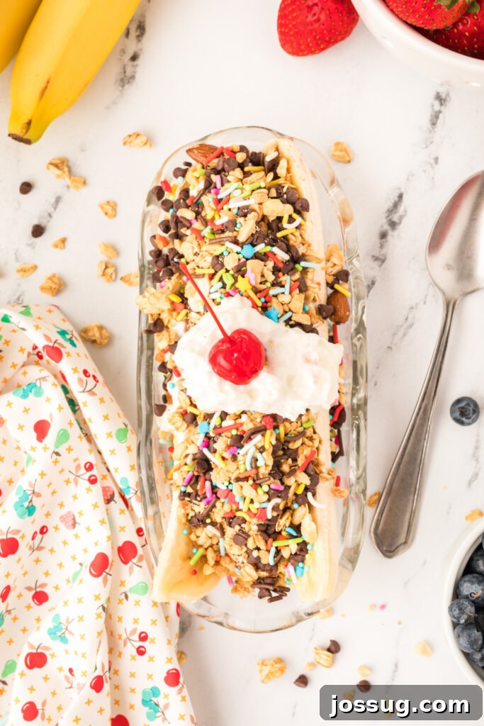 An inviting overhead view of a colorful breakfast banana split, generously topped with an assortment of healthy and fun ingredients.