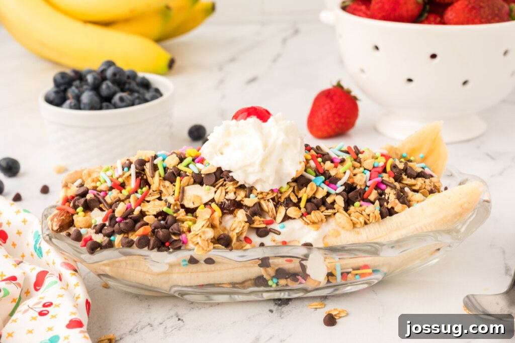 A vibrant and fully assembled breakfast banana split, presented in a classic boat dish, perfect for a joyful morning meal.