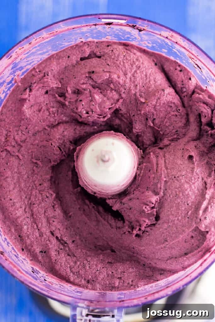 Step 3: Blend until smooth, pour into a serving bowl, and top with garnishes.