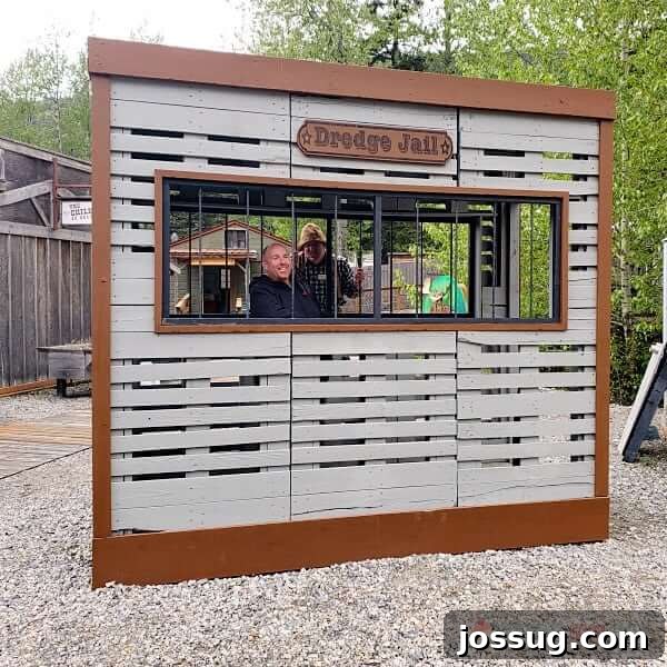 Smooth Sailing from the Start: Embarkation Day Essentials 15 Top Ten Must-Dos on Embarkation Day - Dredge Jail with people inside for photographic purposes.