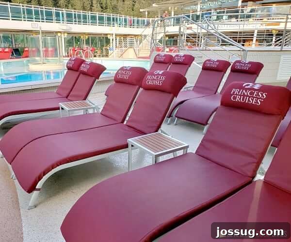 Smooth Sailing from the Start: Embarkation Day Essentials 9 Princess Cruises Lounge Chairs on the pool deck of a cruise ship.