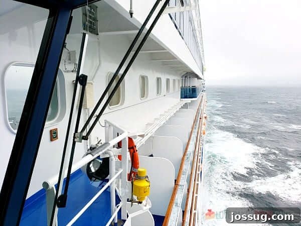 Looking at the private balconies of a cruise ship as it is underway.