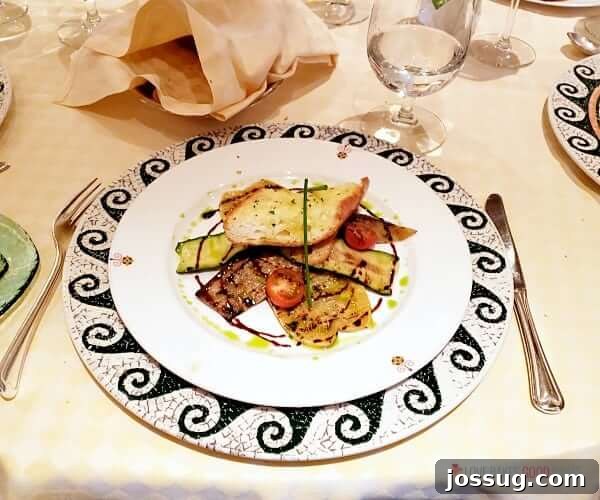 Exquisite food presentation on a plate inside a restaurant on a cruise ship, showcasing gourmet dining.