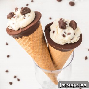 Two Cannoli Cones in a glass, with rich chocolate and creamy filling visible.