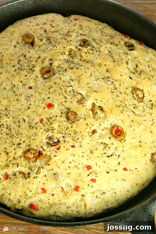 Detailed close-up of the golden-brown crust and textured surface of skillet bread.
