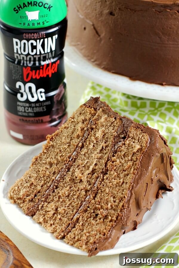 Dreamy Chocolate Milk Cake 4 A plate of Chocolate Milk Cake with a bottle of Shamrock chocolate milk in the background.