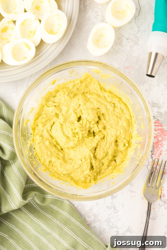 yolk mixture after mayo and pesto is stirred in.