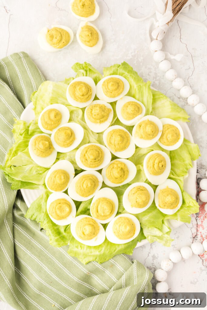 finished pesto deviled eggs on a platter