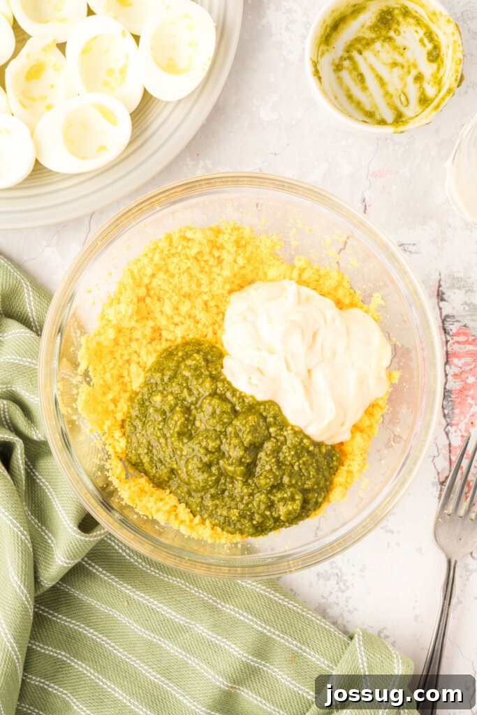 mix in mayonnaise and pesto.