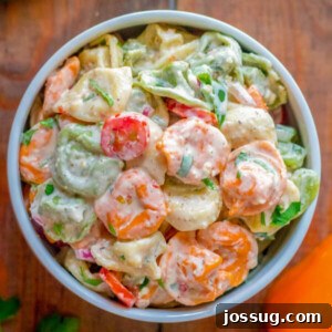 Vibrant Tortellini Pasta Salad in a large serving bowl
