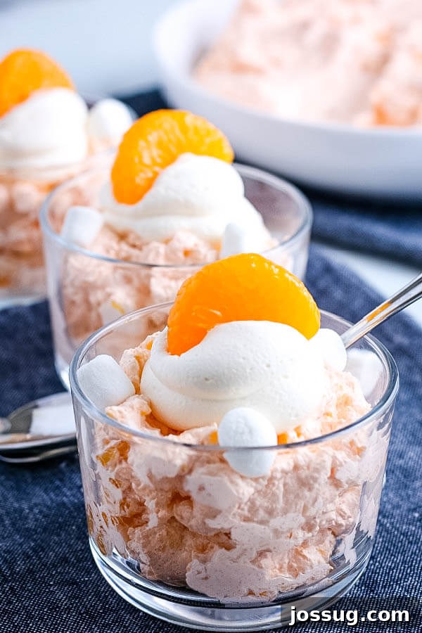 Creamsicle Dream Dessert 10 finished salad ready to eat, shown in a glass bowl with a spoon