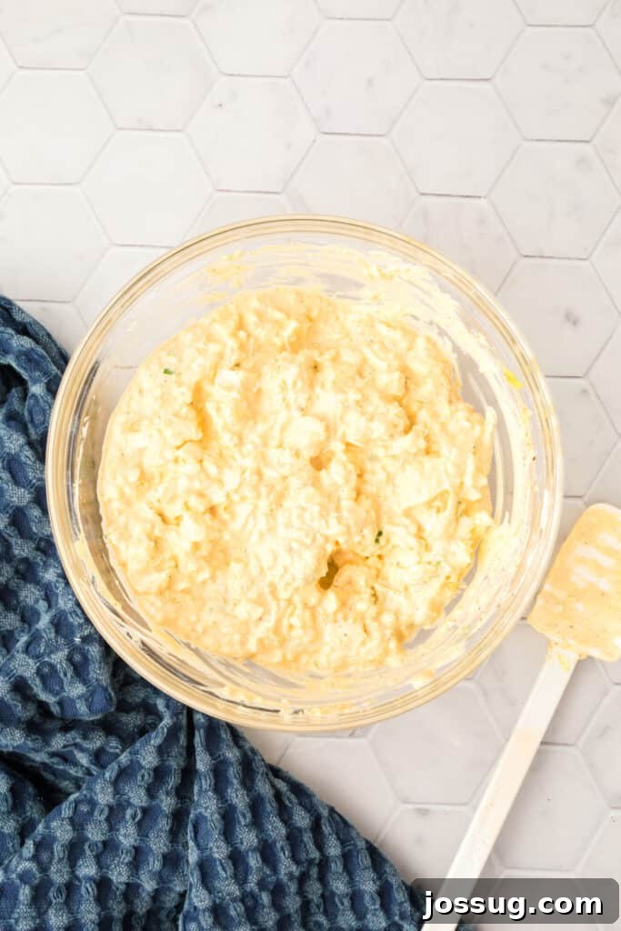 Step 6 of making egg salad: Serve the finished egg salad on bread, crackers, or lettuce.