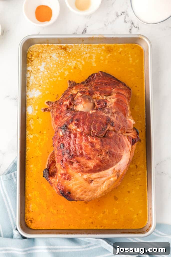 Remove the ham from the oven, remove the foil and turn the oven to broil.