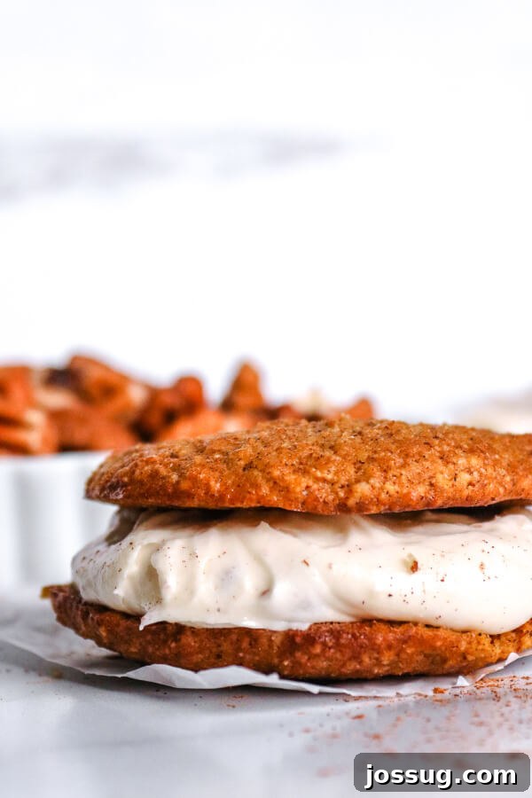 Pumpkin Spice Keto Whoopie Pies 7 Close-up of a finished Keto Pumpkin Whoopie Pie, showcasing the soft cookie and creamy filling.