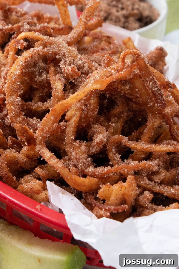 Sweet Apple Cinnamon Fry Curls 2 basket of apple cinnamon curly fries ready to be served with caramel
