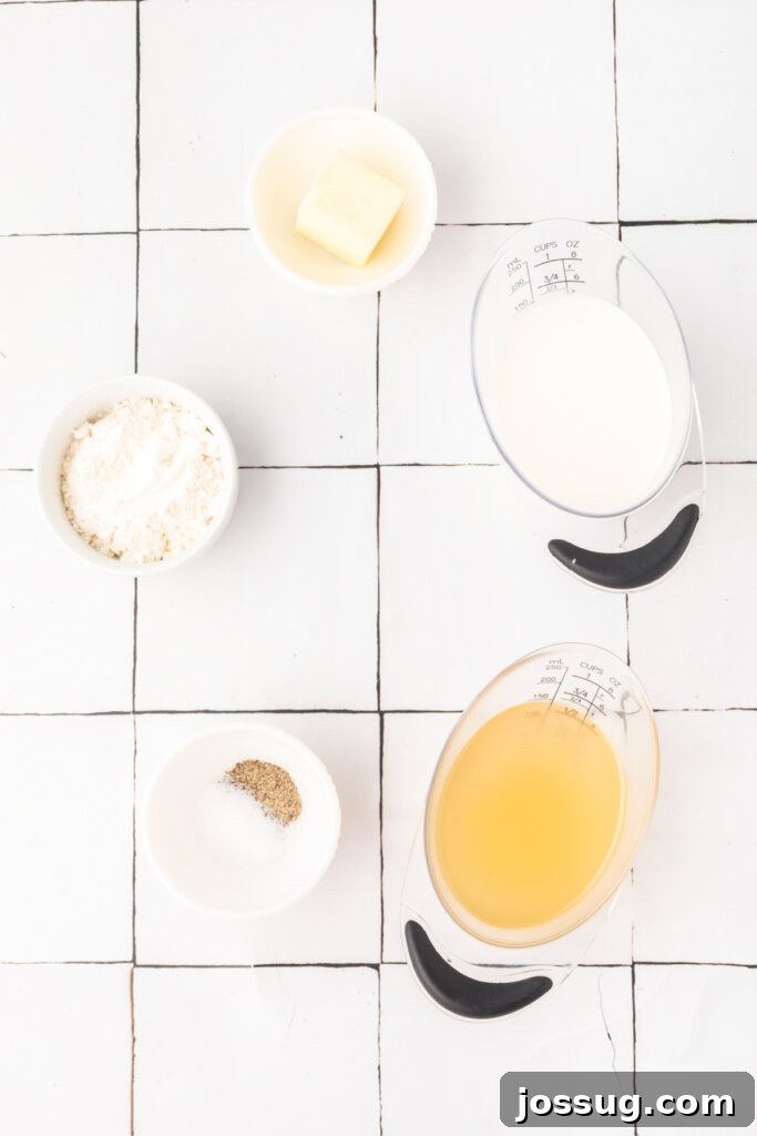 Essential ingredients laid out for making homemade condensed cream soup: butter, flour, broth, milk, salt, and pepper.