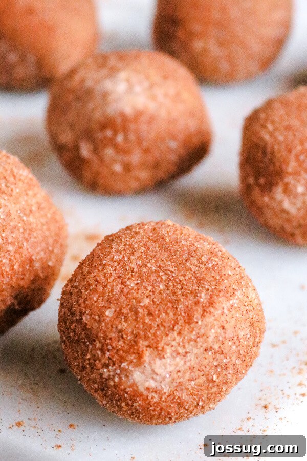 Pumpkin Pie Keto Bites 8 Finished keto pumpkin pie fat bombs arranged on parchment paper, ready to be served or stored.