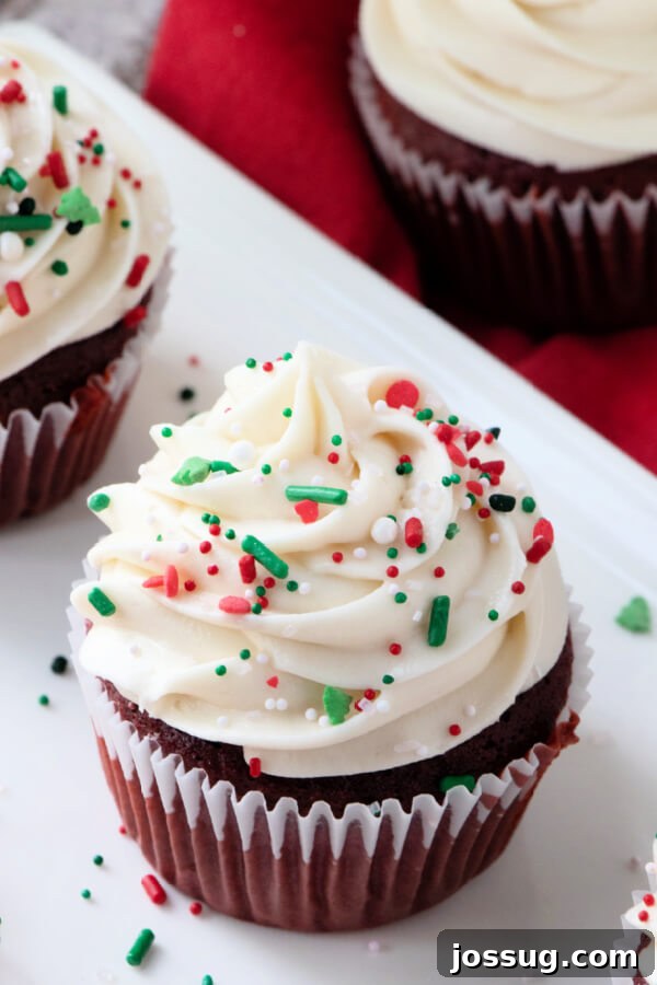 Irresistible Cream Cheese Swirl 2 cream cheese frosting on red velvet cupcake