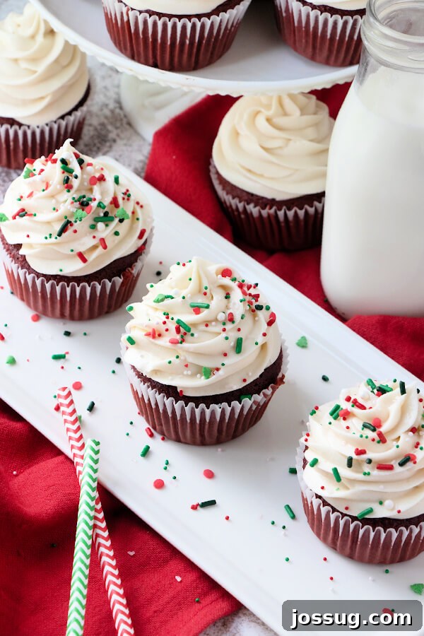 Irresistible Cream Cheese Swirl 7 decorated cupcakes on white plate