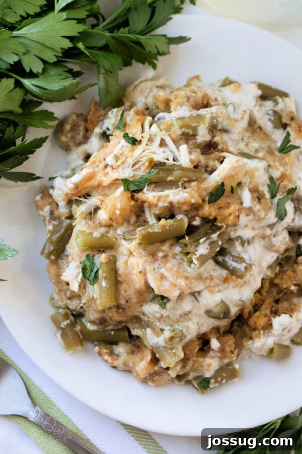 One-Pot Slow Cooker Chicken Stuffing Green Bean Dinner 3 A delicious serving of slow cooker chicken stuffing green bean casserole, perfect for a cozy meal