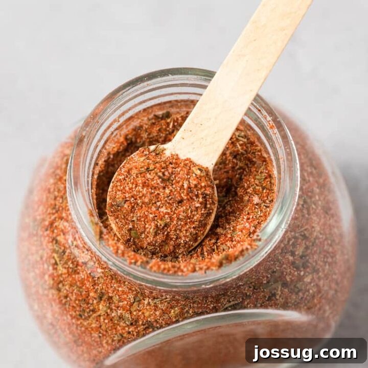 Best Dang Creole Seasoning Recipe in a small glass jar, ready for the pantry.