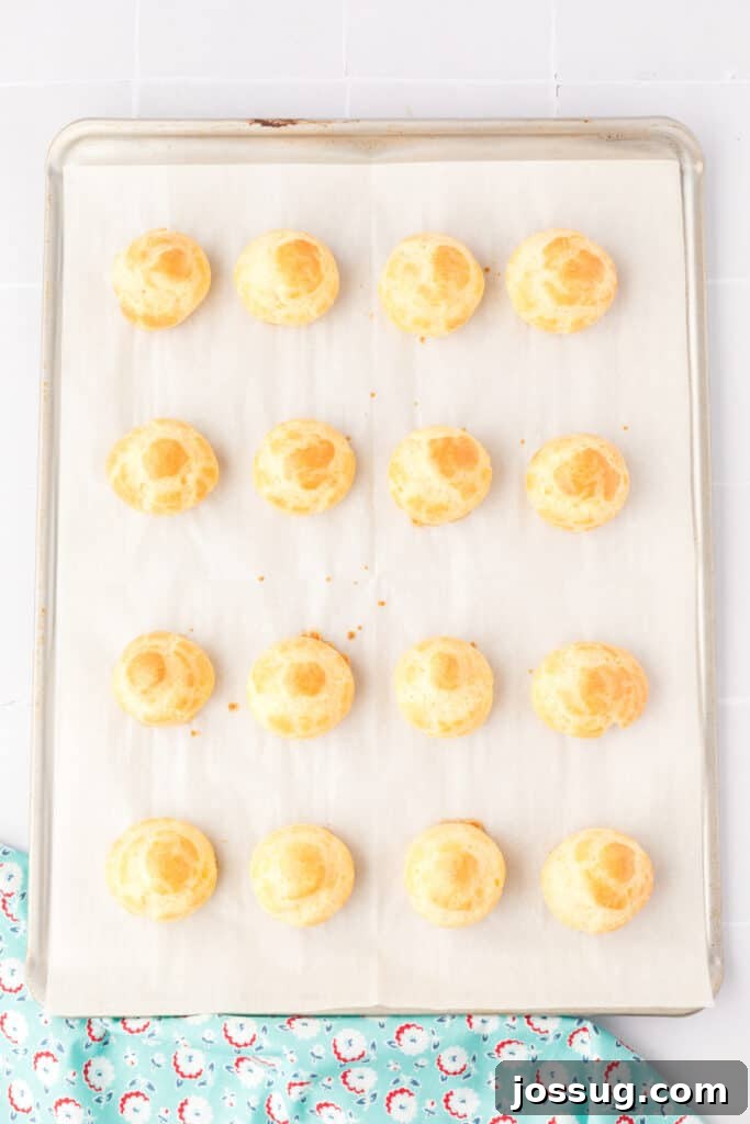 Pillowy Cream Dreams 14 Bake the cream puffs for 25-30 minutes or until they rise beautifully and turn golden brown, creating light and hollow shells.