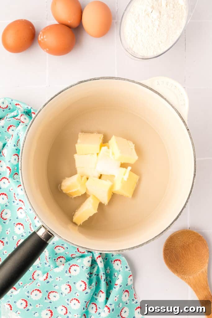 Pillowy Cream Dreams 7 In a medium saucepan over medium-high heat, combine butter, salt, and 1 cup water. Bring the mixture to a boil, creating the initial base for the choux pastry.