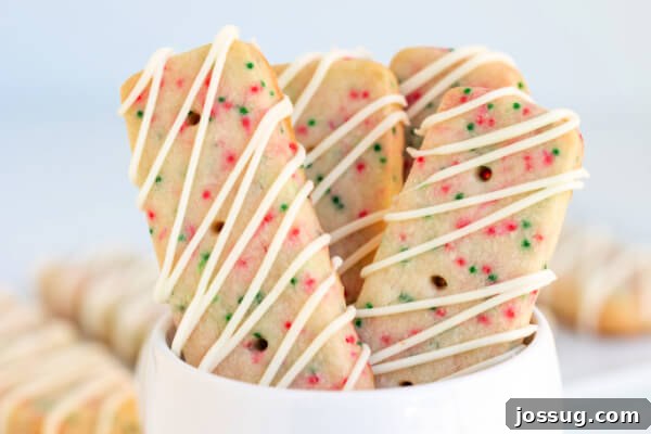 A bowl of assorted Christmas shortbread cookies, perfect for a holiday gathering.
