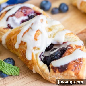 Lemon Blueberry Danish pastries with a sweet lemon cream cheese drizzle