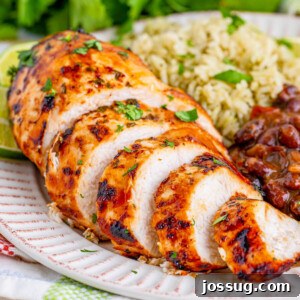 Sliced margarita chicken on white plate