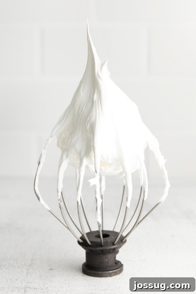 Cloud Cream 3 whisk covered in fluffy homemade marshmallow fluff