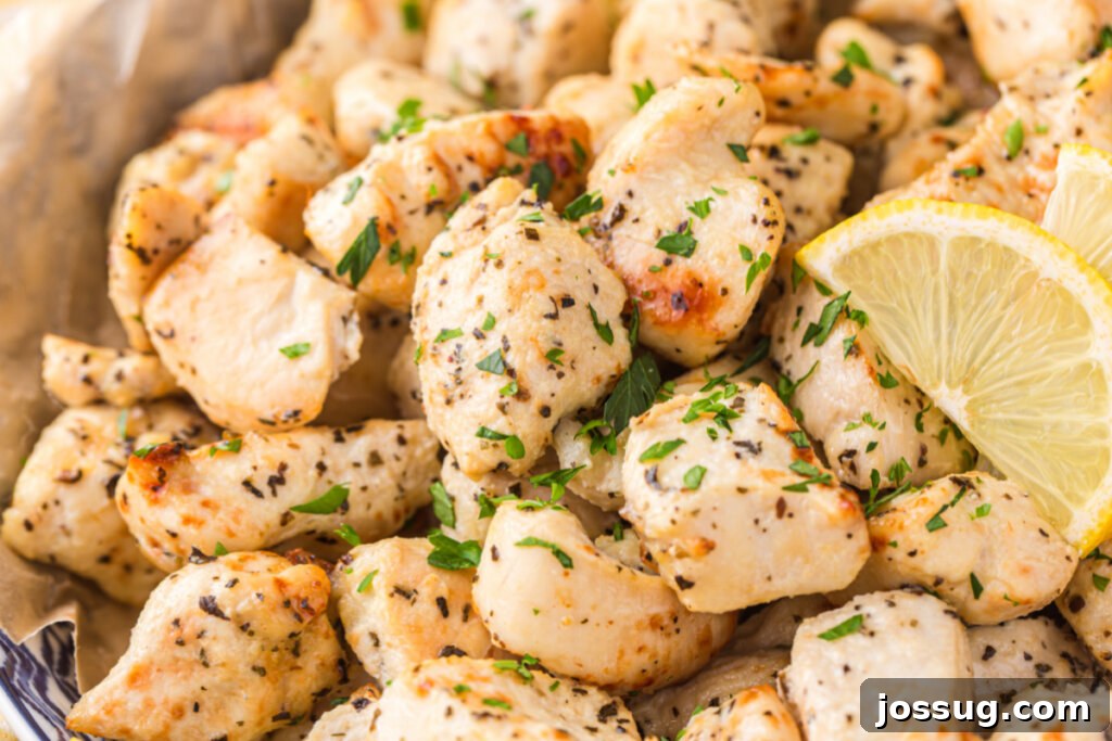 Zesty Lemon Air Fryer Chicken Morsels 6 cooked lemon chicken bites with a lemon slice