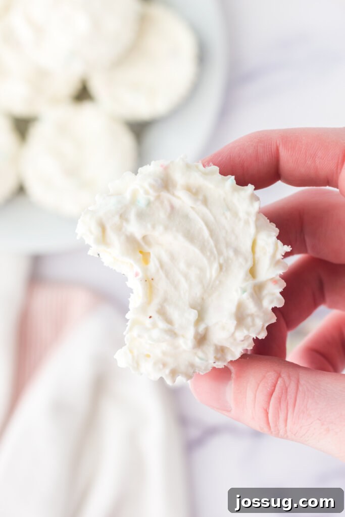 Petite Easter Cheesecakes 4 hand holding mini easter cheesecake