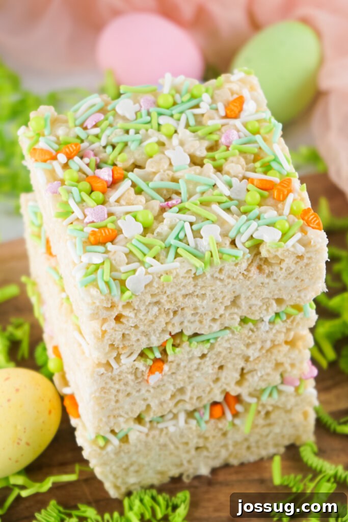 Vibrant Easter Rice Crispy Treats decorated with pastel sprinkles, perfect for spring festivities.