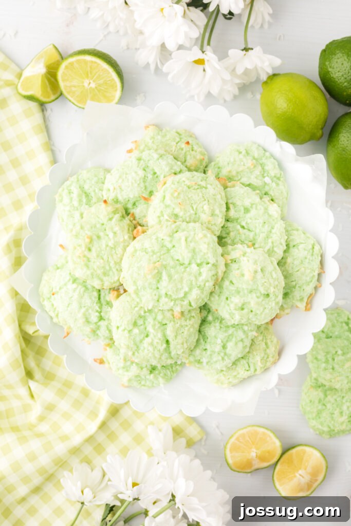 Syrup-Kissed Coconut Delights 2 A plate brimming with golden-brown Soft Sherbet Coconut Cookies, evoking tropical bliss