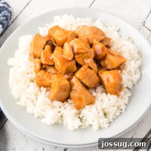 Bourbon Chicken served over rice, ready to eat.