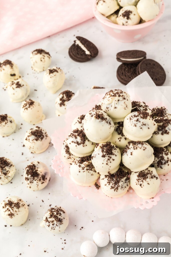 A vibrant display of completed Oreo truffles, neatly arranged on a table, ready to be enjoyed as a delightful dessert.