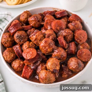 cranberry chipotle meatballs and sausage in white bowl
