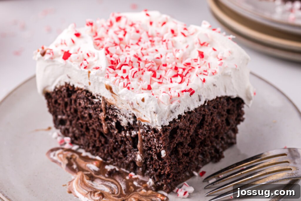 Peppermint Dream Poke Cake 6 slice of peppermint poke cake on plate