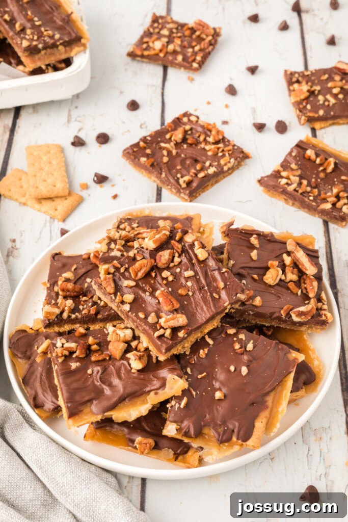 graham cracker toffee stacked on plate, ready to be enjoyed