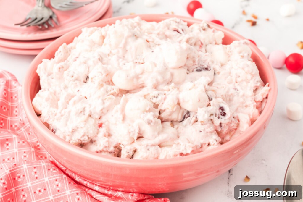 pink bowl with cranberry fluff salad