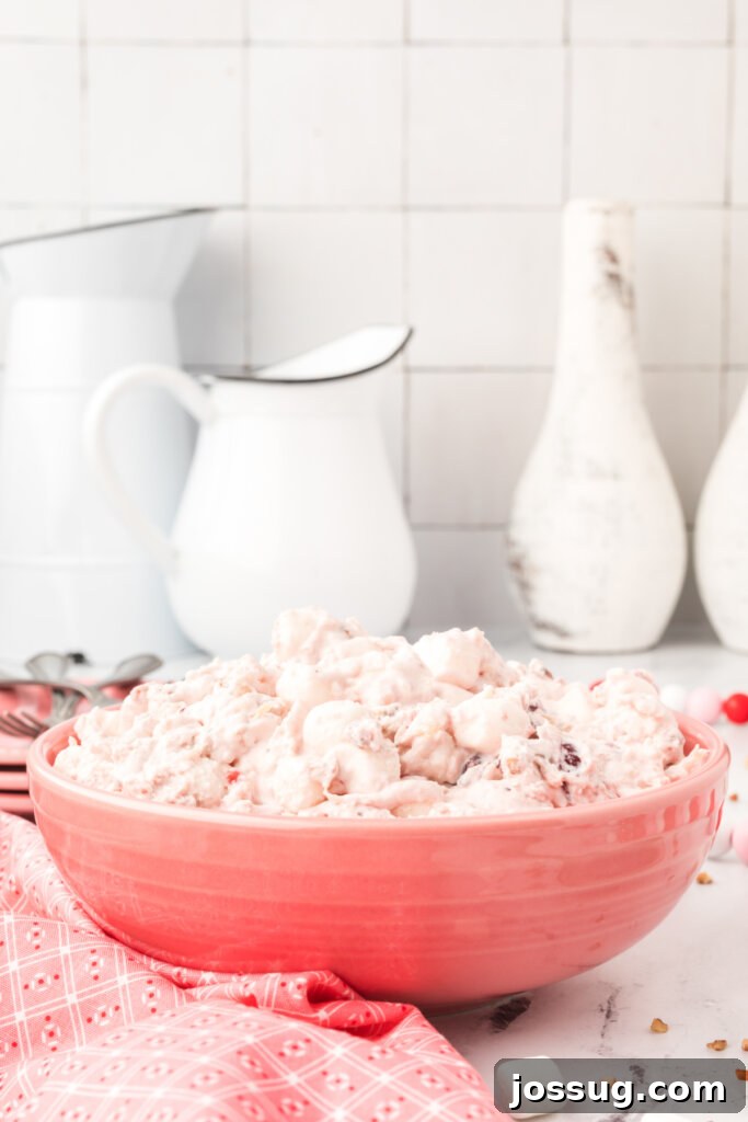 cranberry fluff salad in pink bowl