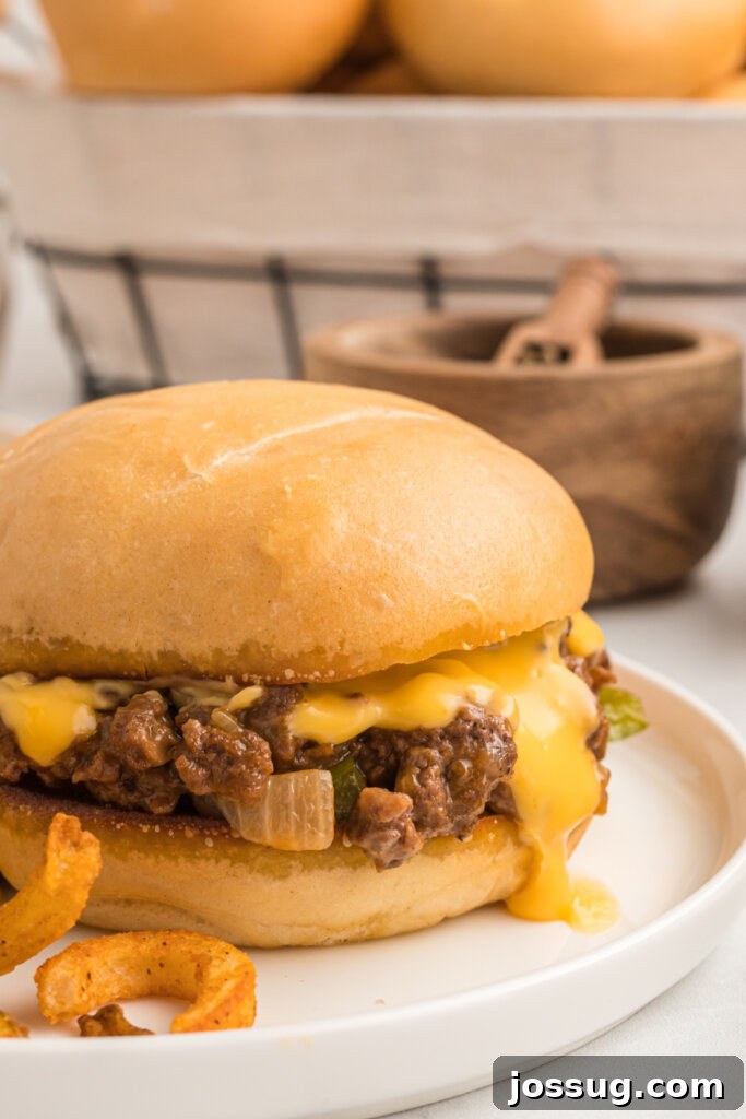 Philly Cheesesteak Sloppy Joe Twist 5 philly cheesesteak sloppy joe sandwich on plate