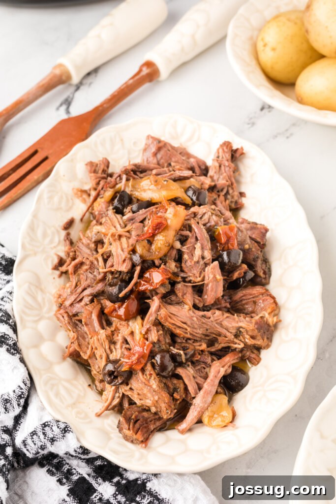 Mediterranean Sunshine Slow Cooker Pot Roast 2 slow cooker mediterranean pot roast on serving platter