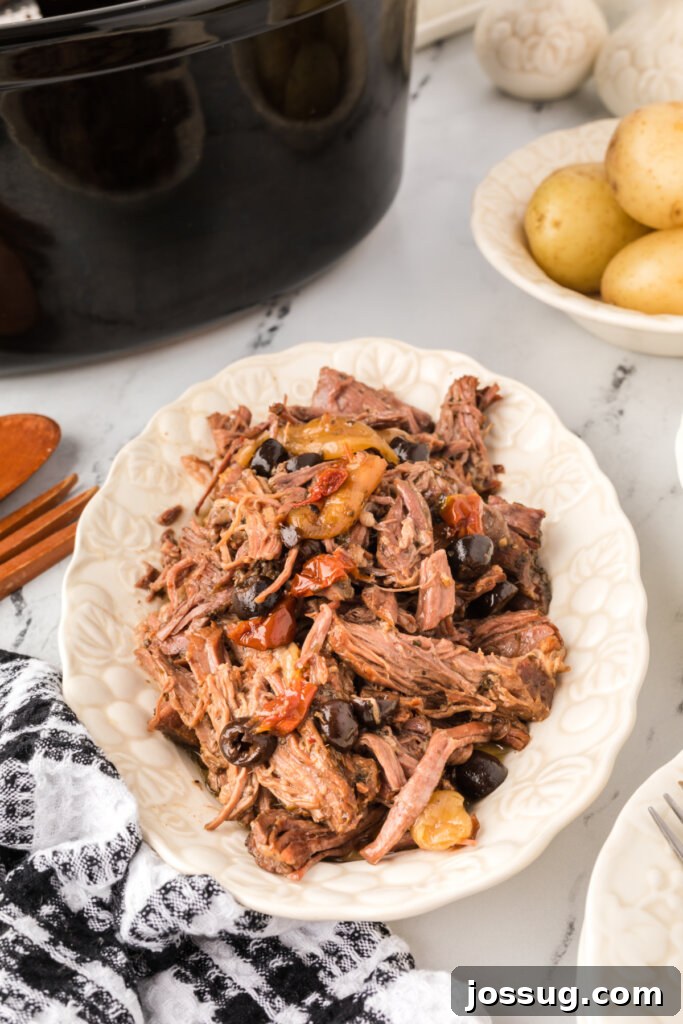 Mediterranean Sunshine Slow Cooker Pot Roast 4 slow cooker mediterranean pot roast on platter