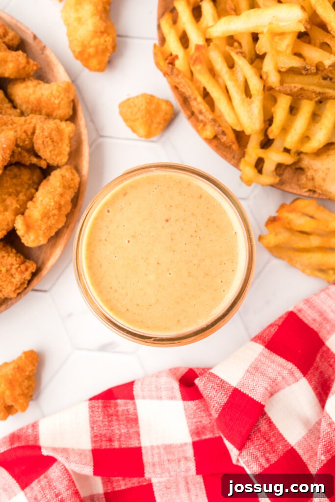 Make Your Own Chick-fil-A Honey Roasted BBQ Sauce 5 looking down into a small bowl with honey roasted bbq sauce